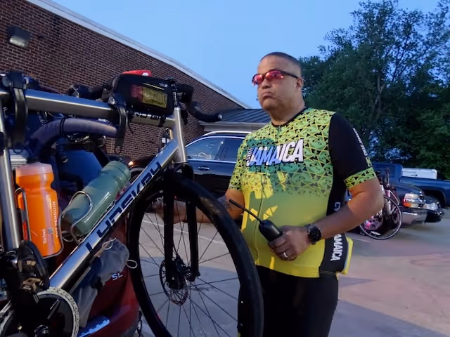 Anthony Brown and his Lynskey titanium bike loaded on the car before a morning start