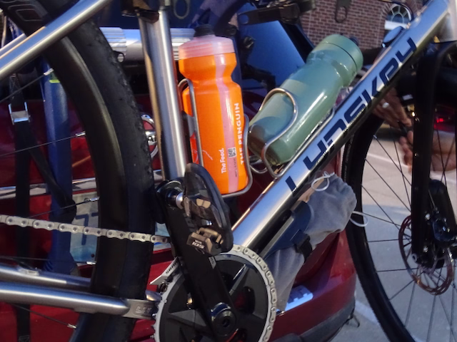 Detail of the Lynskey titanium frame with bottles mounted before the Redbud Ride